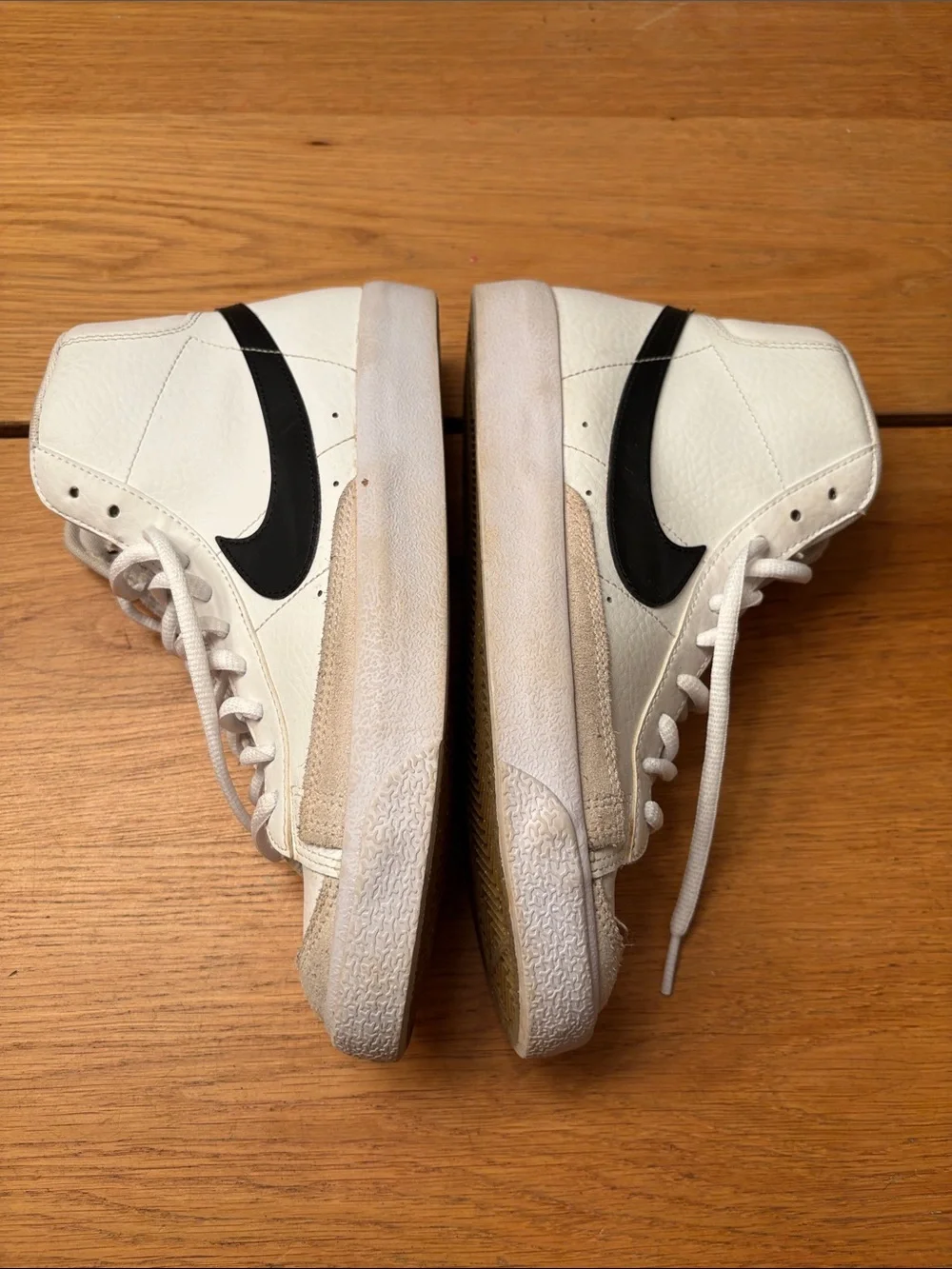 Nike Blazers High-Top Sneakers in White with Black Swoosh